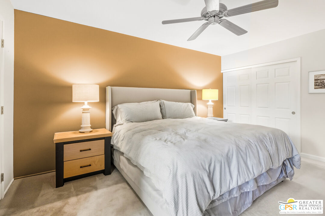 1103 East Alejo Road Palm Springs, CA 92262 - Photo 29 of 39 a bedroom with a bed and a night stand