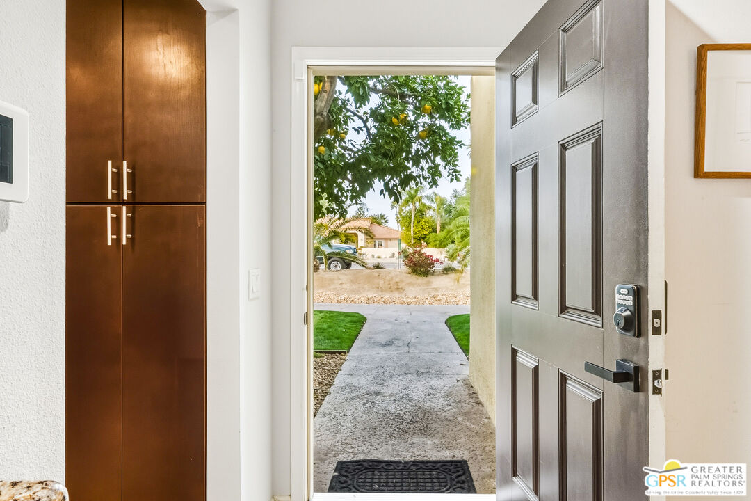 1103 East Alejo Road Palm Springs, CA 92262 - Photo 7 of 39 hallway view with wooden floor