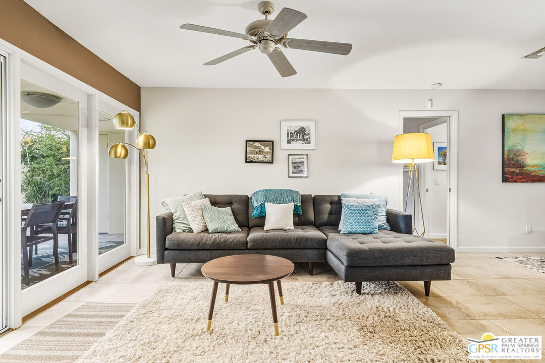 1103 East Alejo Road Palm Springs, CA 92262 - Photo 10 of 39 a living room with furniture and a table