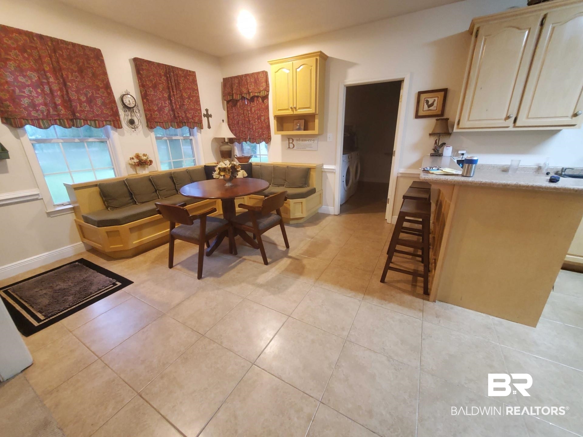 31163 Woodland Way Daphne, AL 36527 - Photo 24 of 44 Dining room featuring washer / clothes dryer and light tile patterned floors