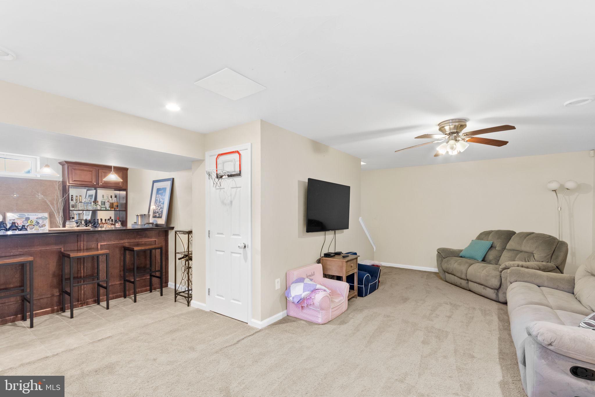 93 Weathervane Drive Mount Royal, NJ 08061 - Photo 17 of 22 a bedroom with furniture and a flat screen tv
