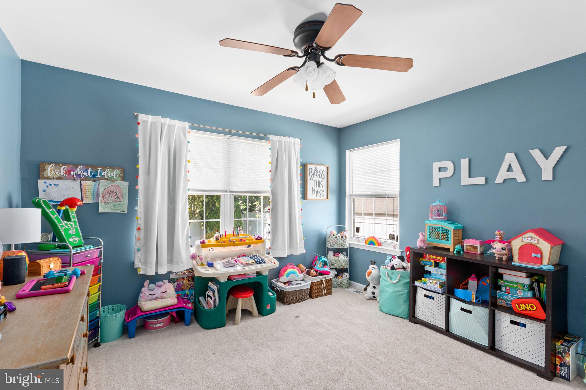 93 Weathervane Drive Mount Royal, NJ 08061 - Photo 9 of 22 a children room with toys and a baby bed