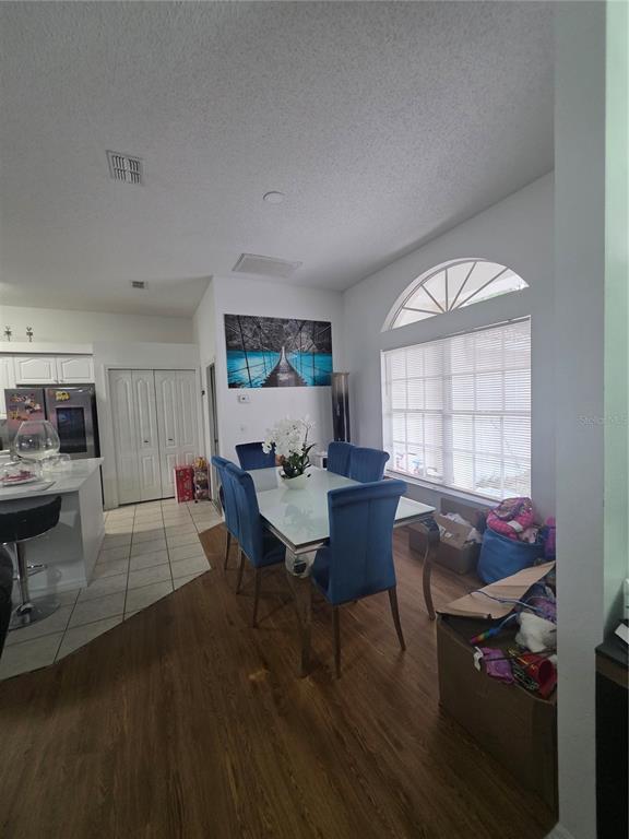 17820 Monteverde Drive Spring Hill, FL 34610 - Photo 16 of 42 a view of a dining room with furniture and window