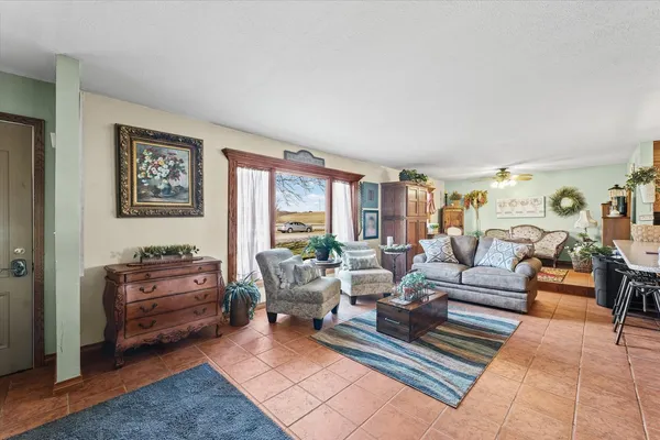 a kitchen with stainless steel appliances a refrigerator a sink a stove and cabinets