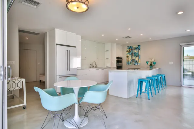 a bathroom with a sink toilet and mirror