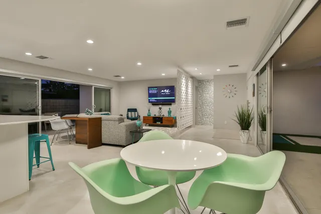 a bathroom with a sink toilet and mirror