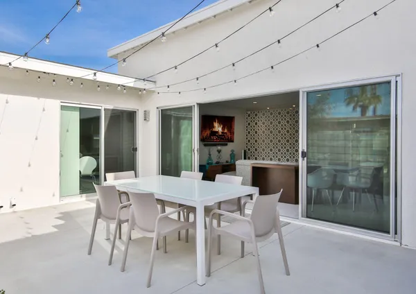a view of a swimming pool with a patio