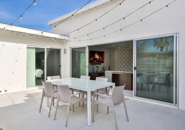 a view of a swimming pool with a patio