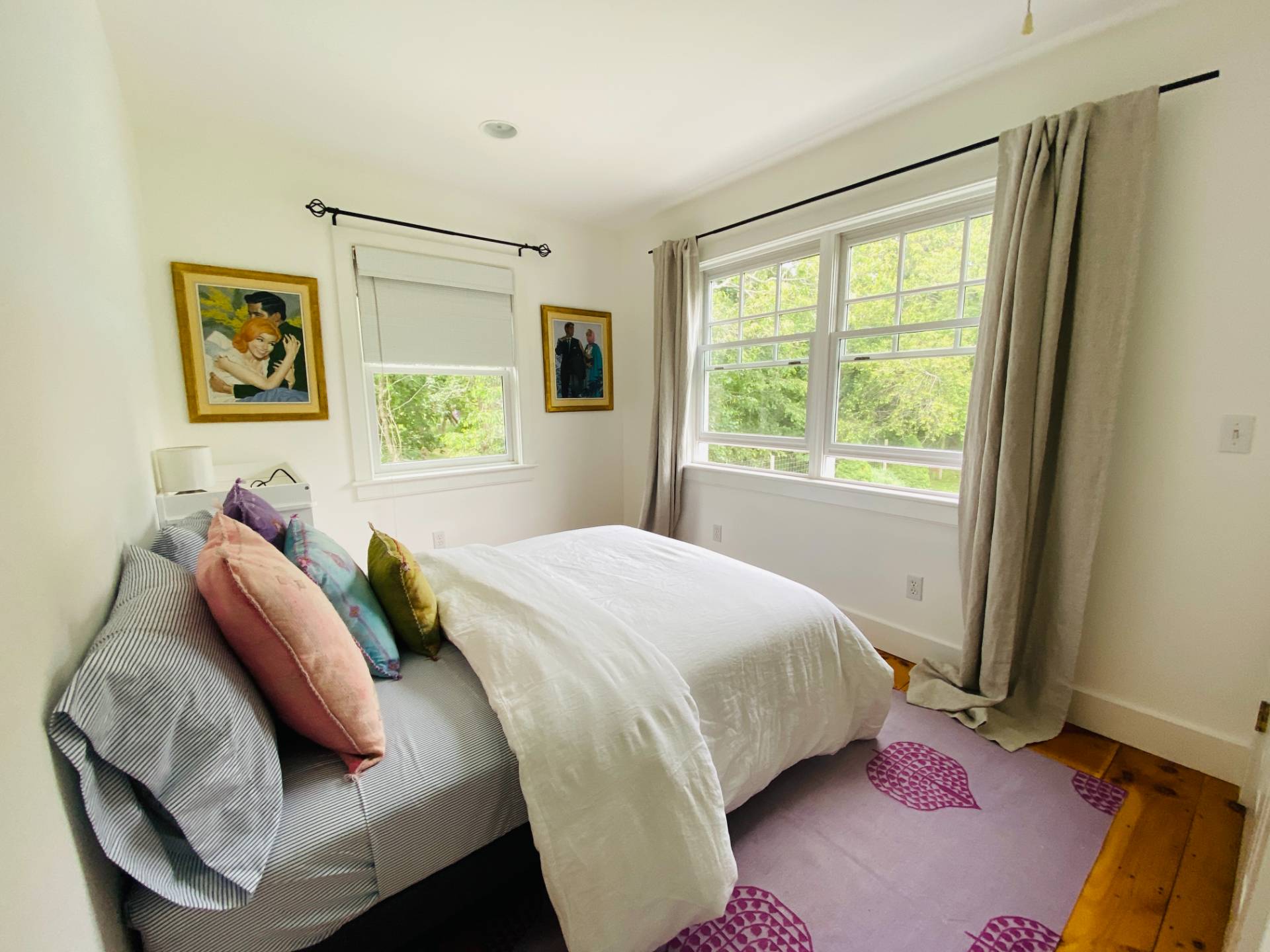 Undisclosed Address Bridgehampton, NY 11932 - Photo 15 of 21 a bedroom with a bed and a window