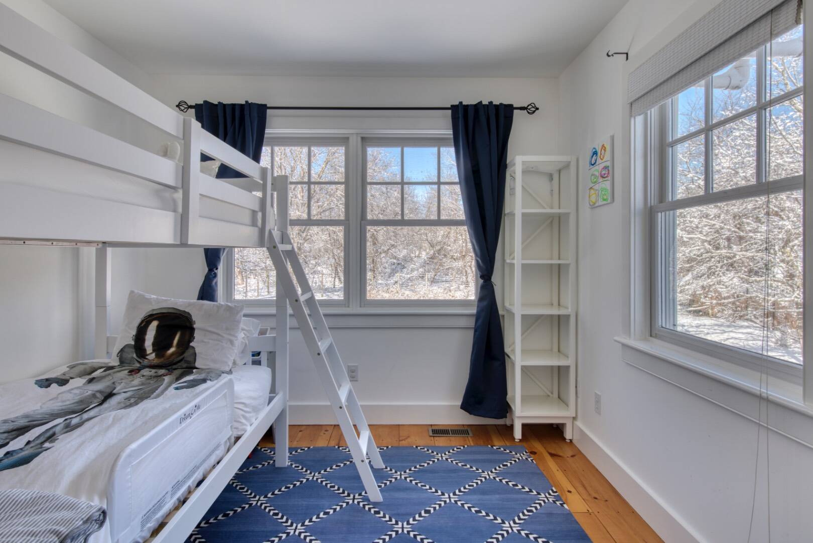 Undisclosed Address Bridgehampton, NY 11932 - Photo 17 of 21 a bed room with a bed and a window