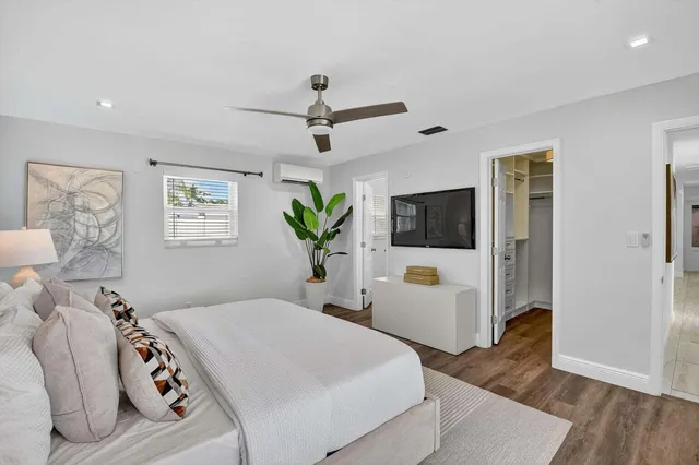 a bathroom with a sink vanity and a mirror