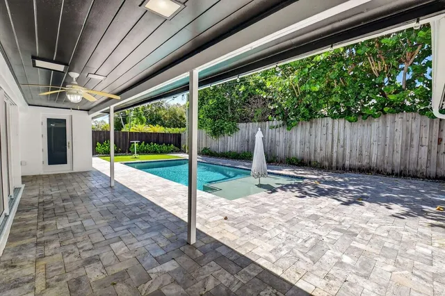 a kitchen with a stove and a refrigerator