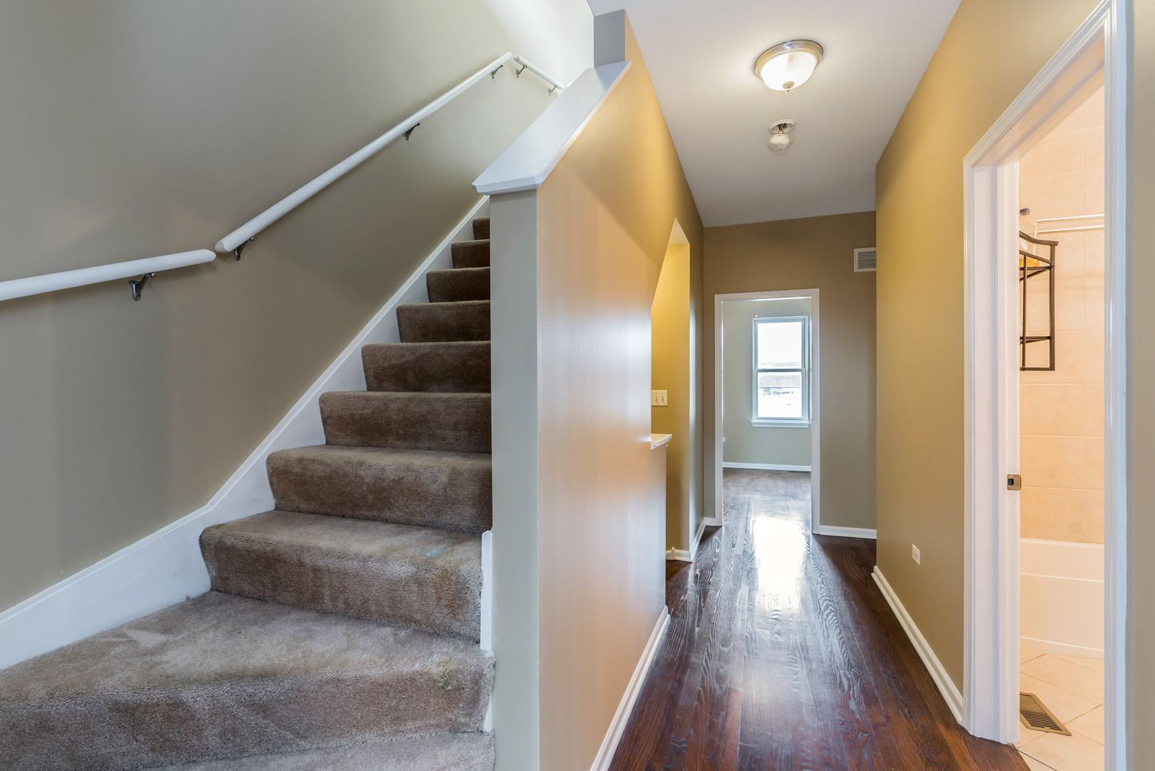 721 West 15th Street Chicago, IL 60607 - Photo 21 of 27 a view of entryway and hall with wooden floor