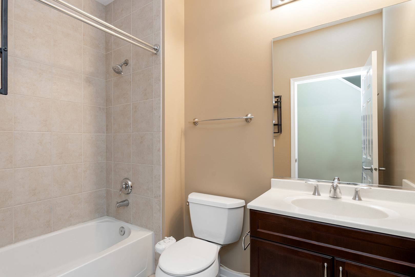 721 West 15th Street Chicago, IL 60607 - Photo 22 of 27 a bathroom with a sink a toilet and shower