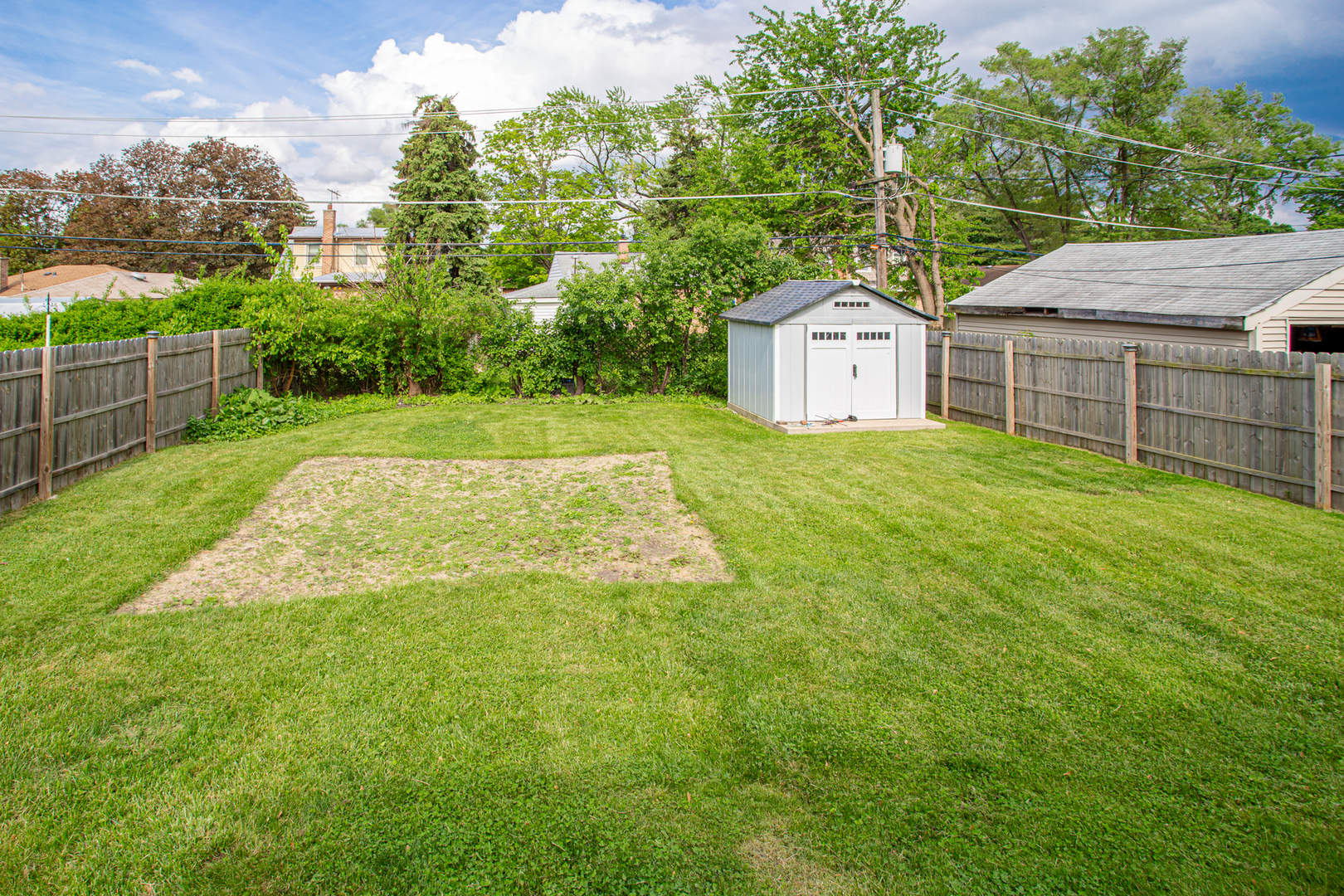 243 Clayton Road Hillside, IL 60162 - Photo 16 of 17 a view of backyard of house with green space