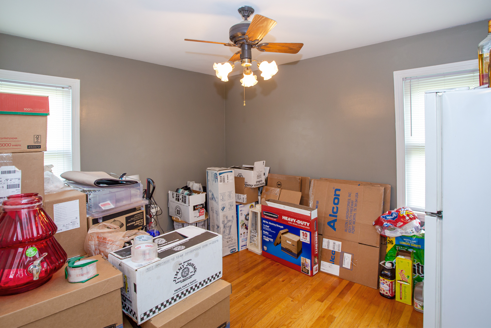 243 Clayton Road Hillside, IL 60162 - Photo 10 of 17 a bedroom with a bed and a chandelier