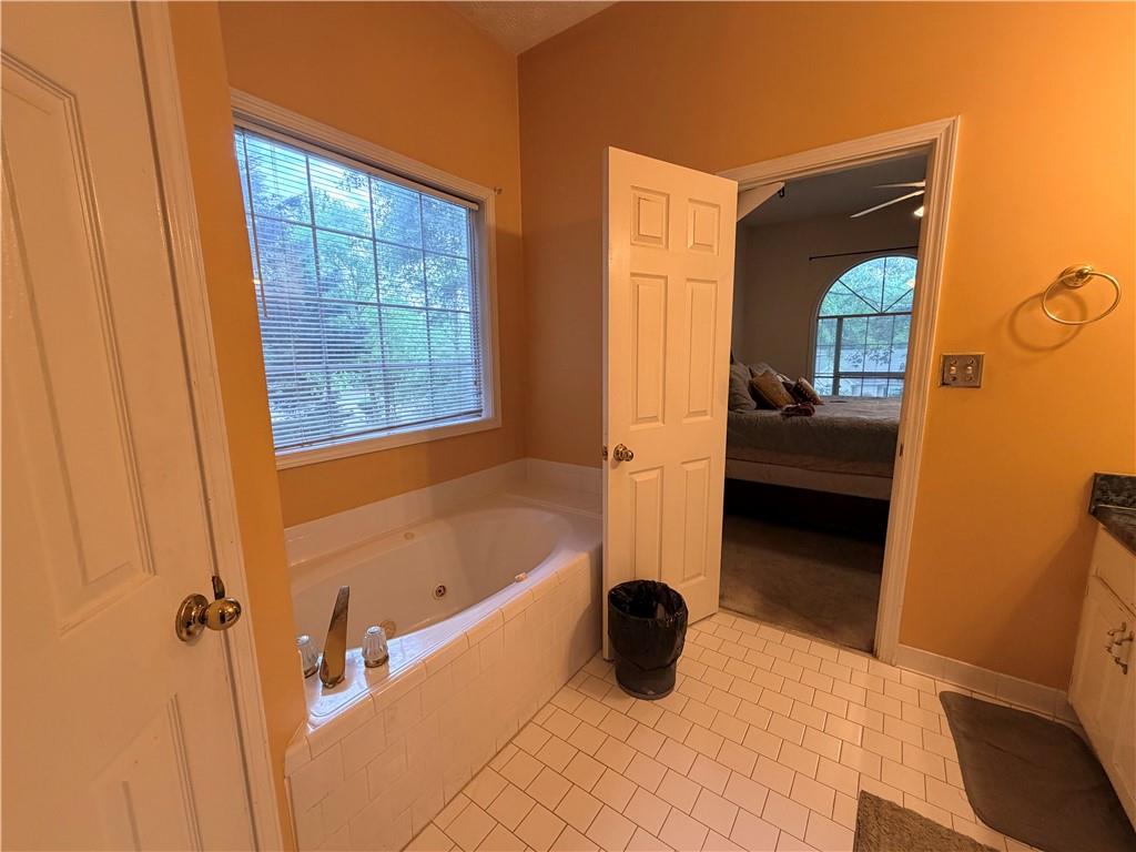 426 Pates Lake Court Hampton, GA 30228 - Photo 31 of 60 a view of an empty room with a window