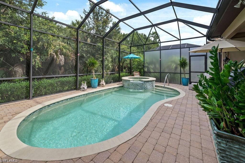 6565 Roma Way Naples, FL 34113 - Photo 21 of 32 a view of outdoor space yard and patio