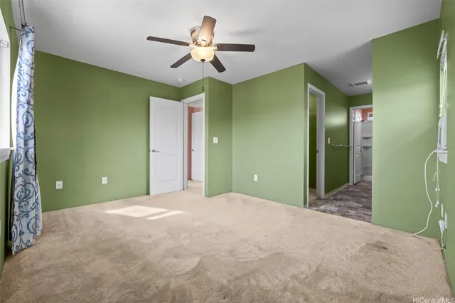 a bathroom with a shower and a sink