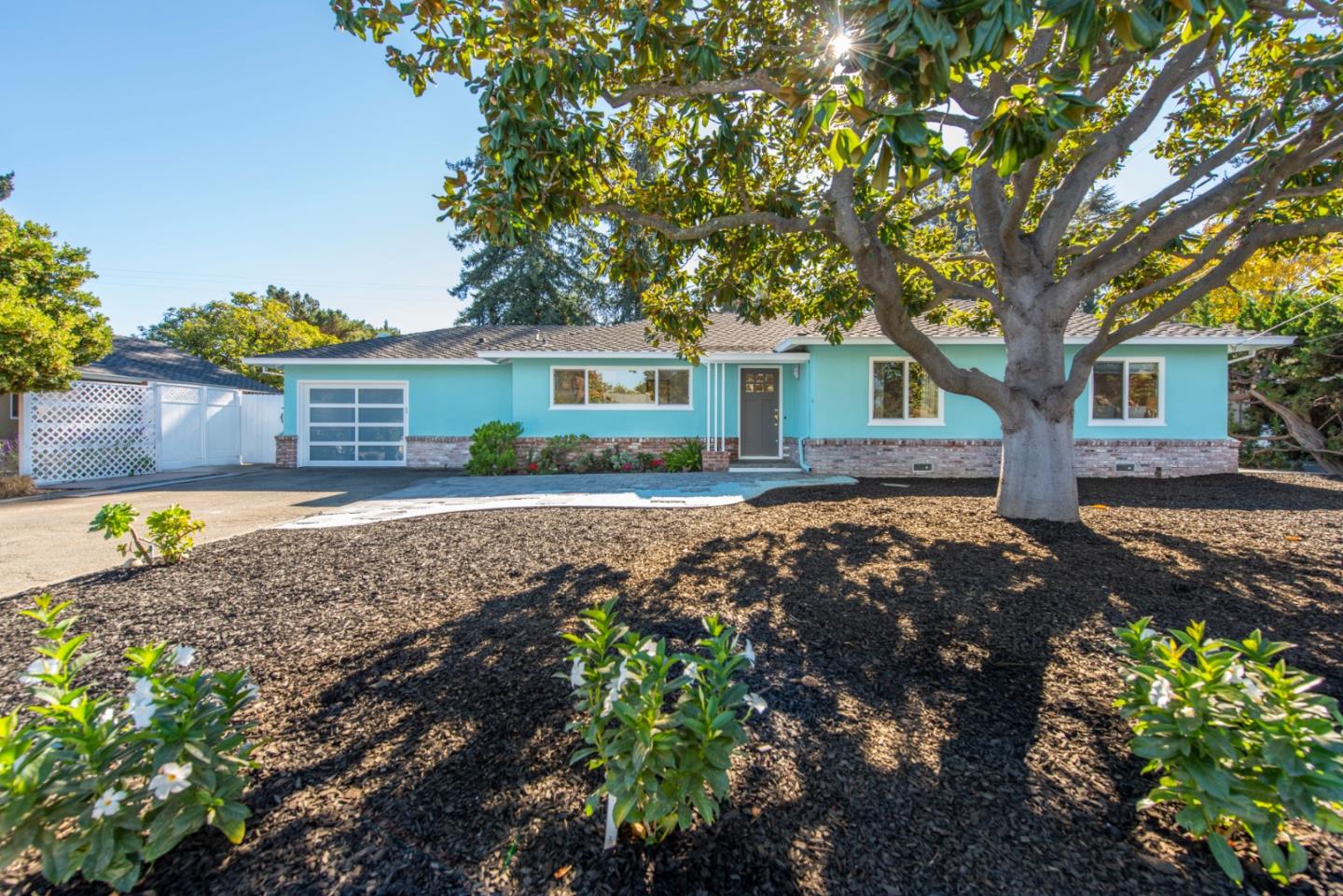 82 Loucks Avenue Los Altos, CA 94022 - Photo 1 of 23 a house view with a garden space