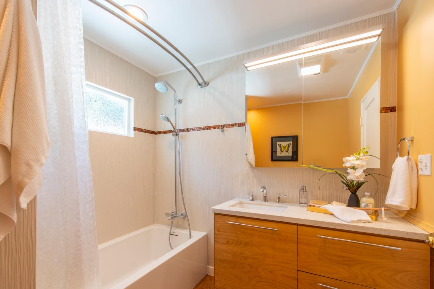 82 Loucks Avenue Los Altos, CA 94022 - Photo 13 of 23 a bathroom with a bathtub and a sink