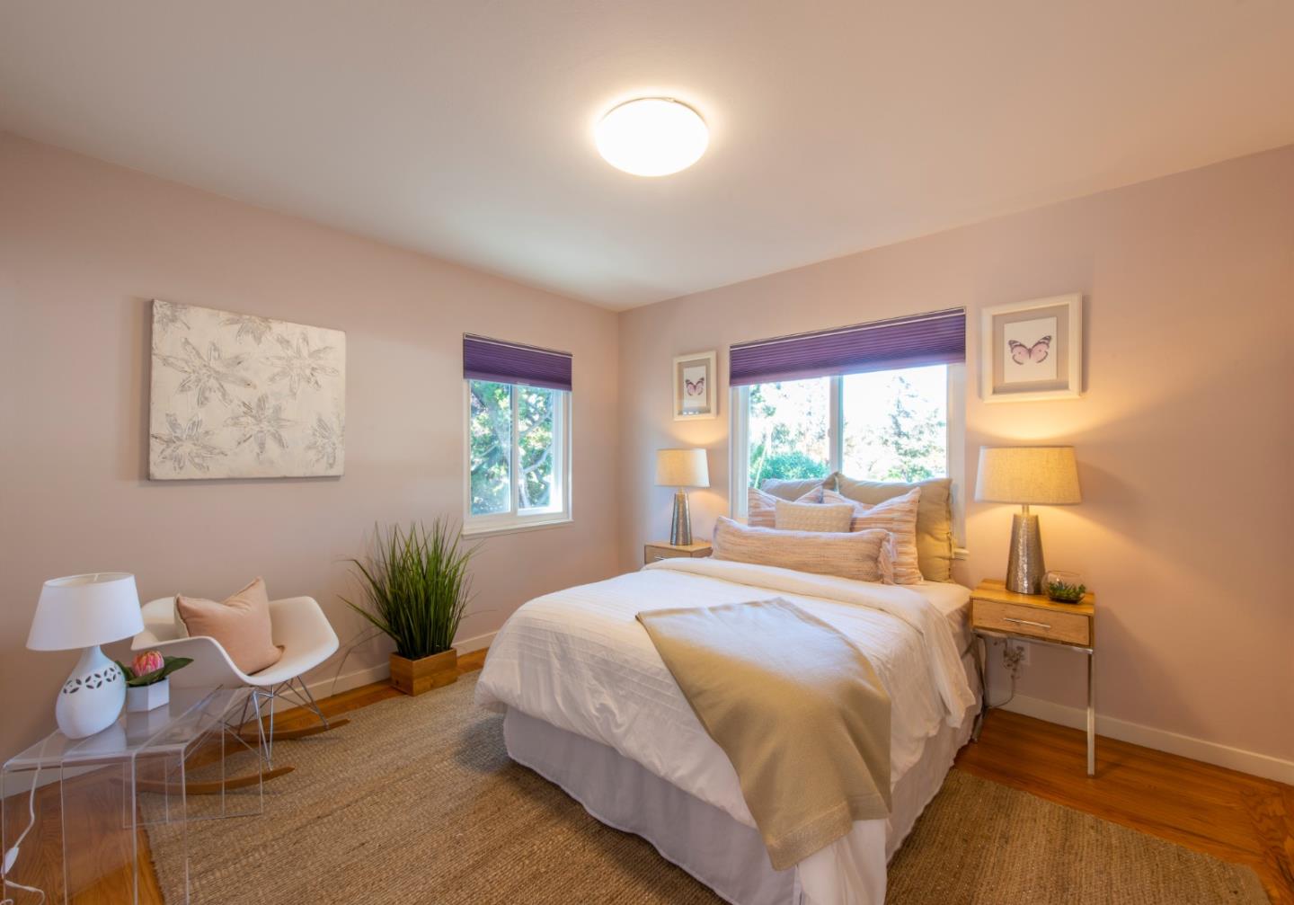 82 Loucks Avenue Los Altos, CA 94022 - Photo 14 of 23 a bedroom with a bed and wooden floor