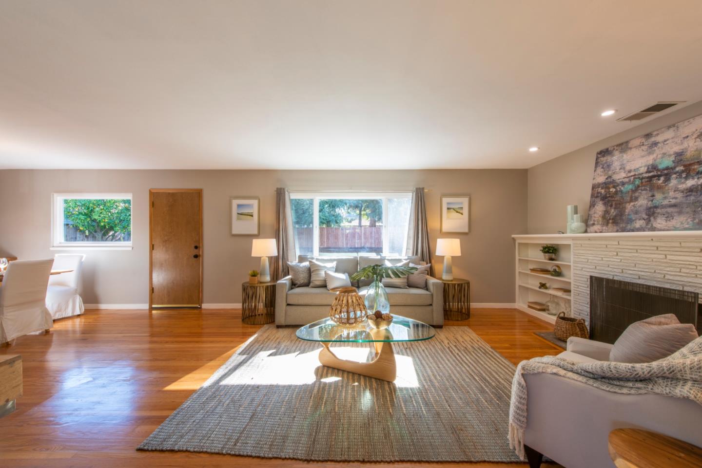 82 Loucks Avenue Los Altos, CA 94022 - Photo 2 of 23 a living room with furniture and a fireplace