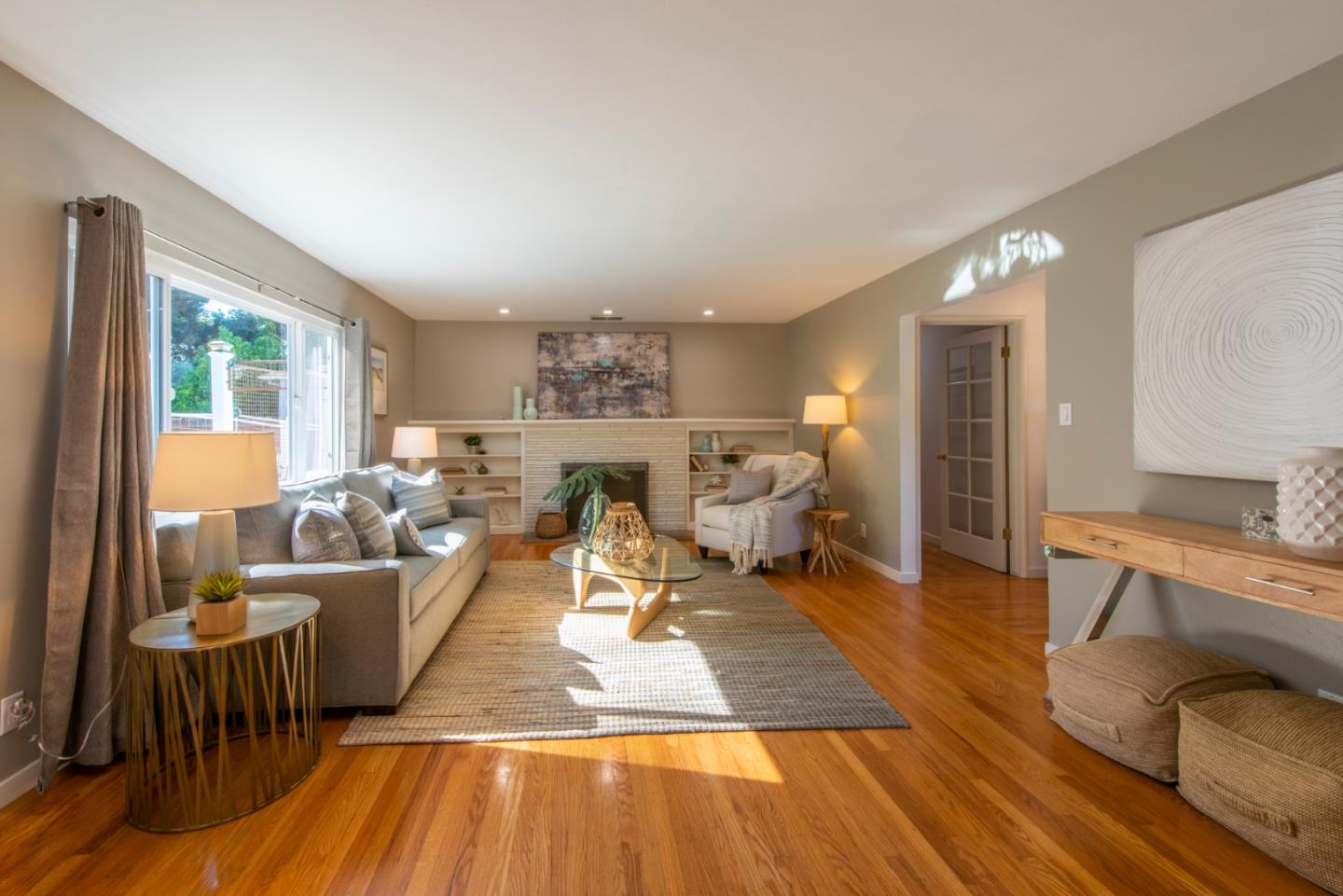 82 Loucks Avenue Los Altos, CA 94022 - Photo 3 of 23 a living room with furniture and a wooden floor