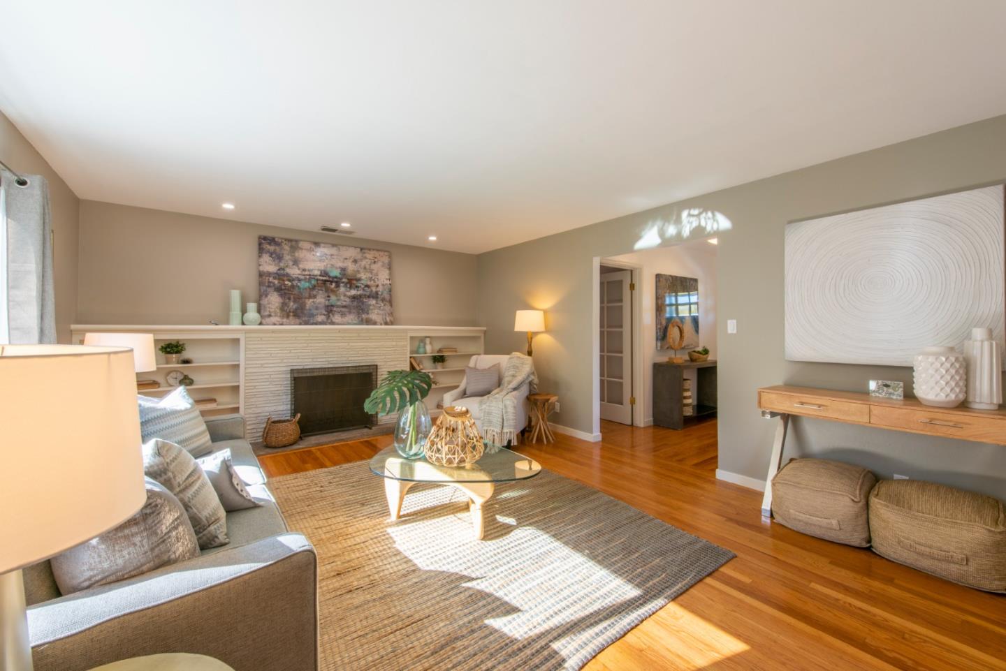 82 Loucks Avenue Los Altos, CA 94022 - Photo 5 of 23 a living room with furniture and a fireplace