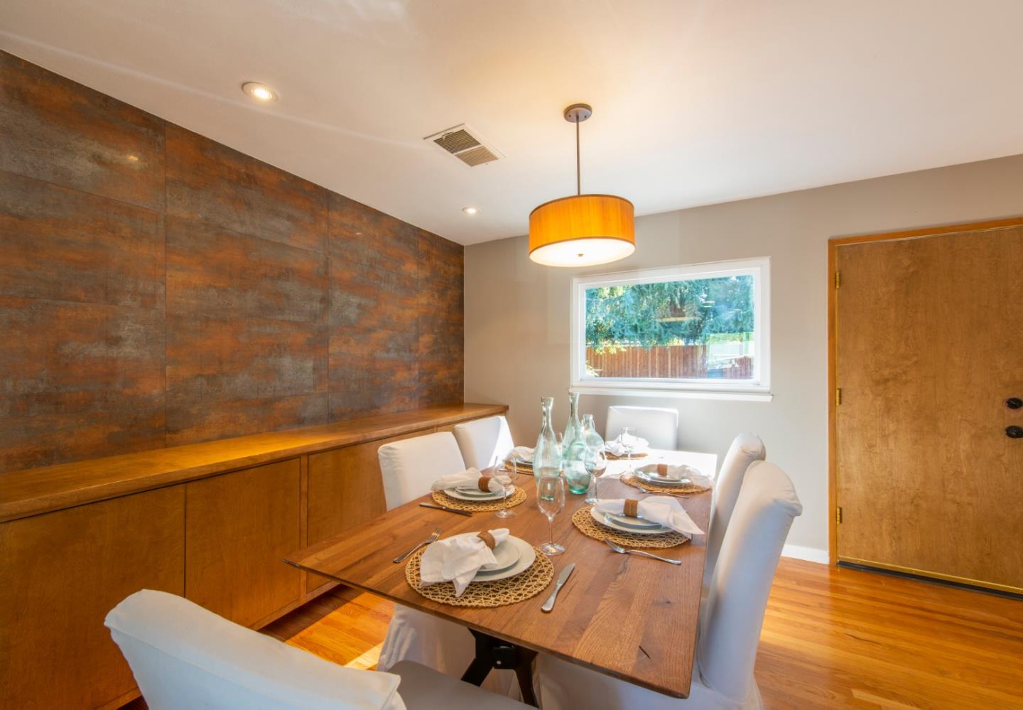 82 Loucks Avenue Los Altos, CA 94022 - Photo 9 of 23 a view of a dining room with furniture and wooden floor