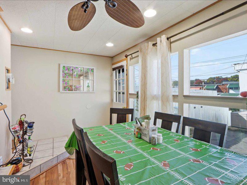 4344 Annapolis Road Halethorpe, MD 21227 - Photo 20 of 35 a view of a dining room with furniture window and wooden floor