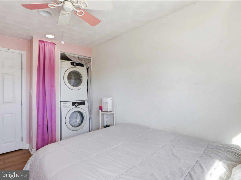4344 Annapolis Road Halethorpe, MD 21227 - Photo 25 of 35 a bedroom with a bed and cabinets