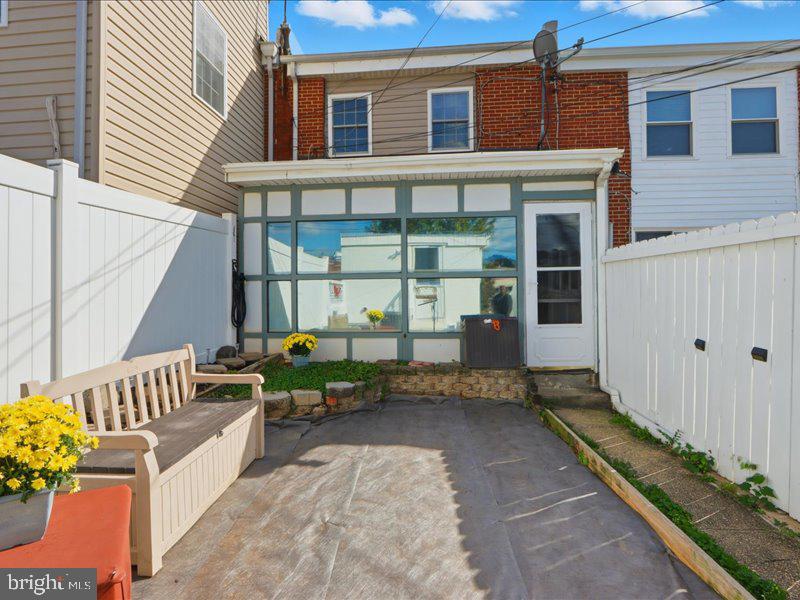 4344 Annapolis Road Halethorpe, MD 21227 - Photo 27 of 35 a building outdoor space with patio furniture and potted plants
