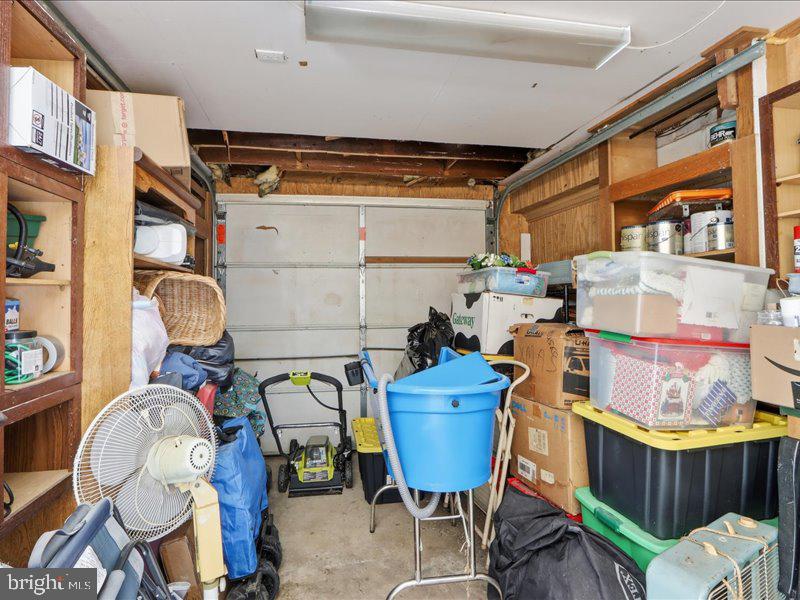4344 Annapolis Road Halethorpe, MD 21227 - Photo 34 of 35 a utility room with lots of wooden furniture and windows