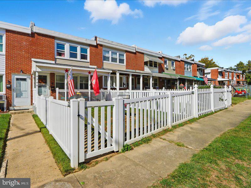 4344 Annapolis Road Halethorpe, MD 21227 - Photo 4 of 35 a front view of a house with iron fence