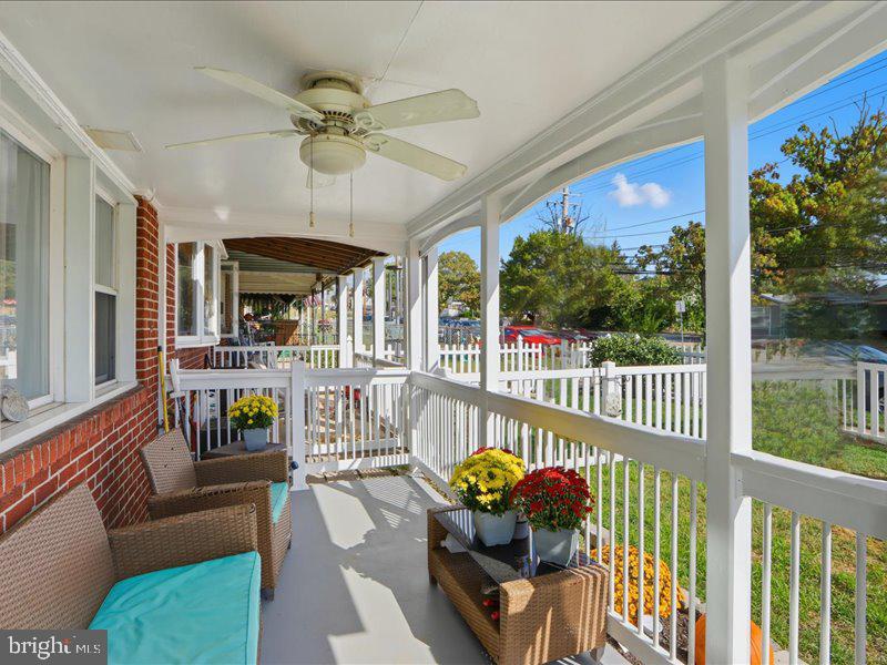 4344 Annapolis Road Halethorpe, MD 21227 - Photo 7 of 35 a view of a porch with furniture