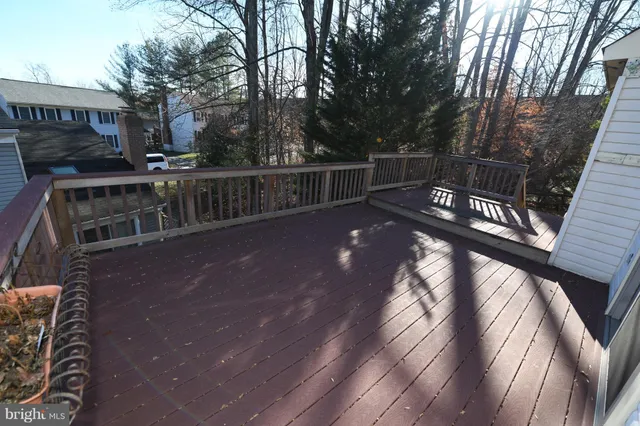 a view of balcony with wooden floor