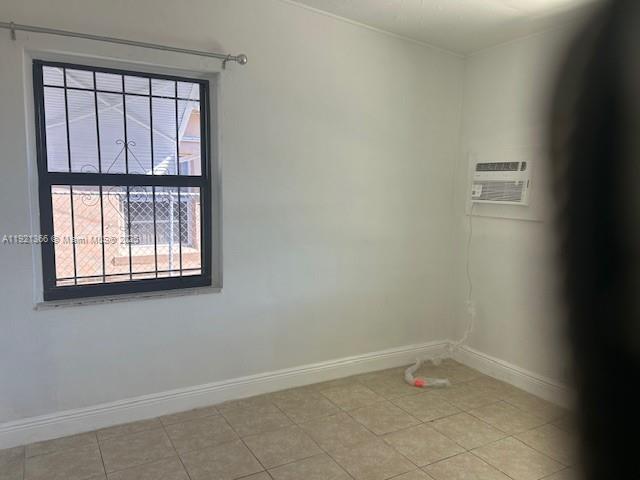 2230 Service Road, Unit 1 Opa-Locka, FL 33054 - Photo 11 of 15 an empty room with a window