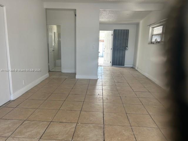 2230 Service Road, Unit 1 Opa-Locka, FL 33054 - Photo 12 of 15 a view of a livingroom with an empty space and window