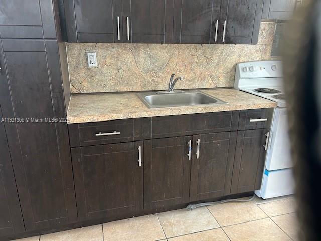 2230 Service Road, Unit 1 Opa-Locka, FL 33054 - Photo 2 of 15 a sink with a cabinets
