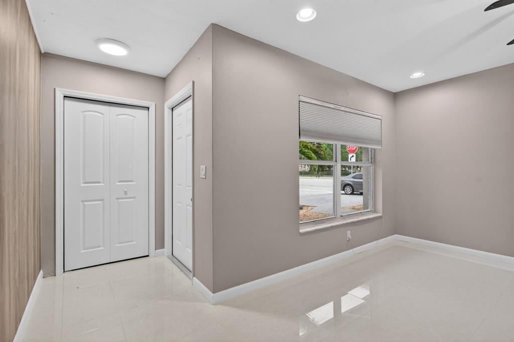 8709 Northwest 57th Drive Tamarac, FL 33321 - Photo 11 of 34 a view of an empty room with a window