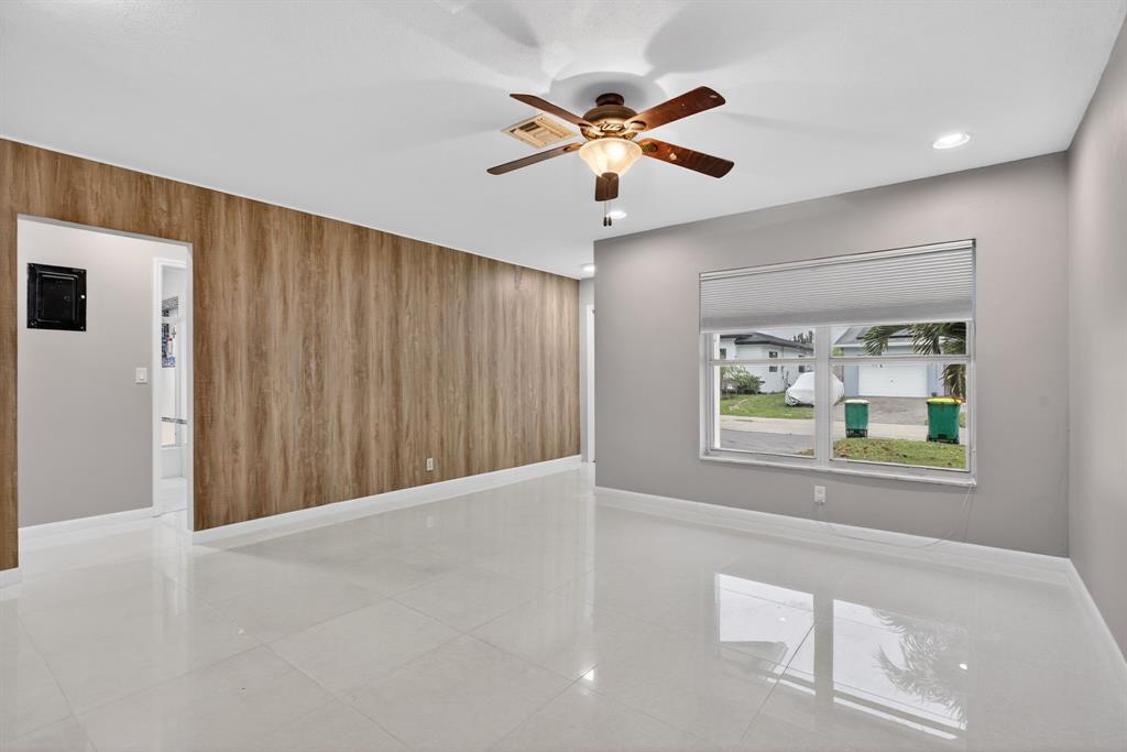 8709 Northwest 57th Drive Tamarac, FL 33321 - Photo 14 of 34 a view of an empty room with a window