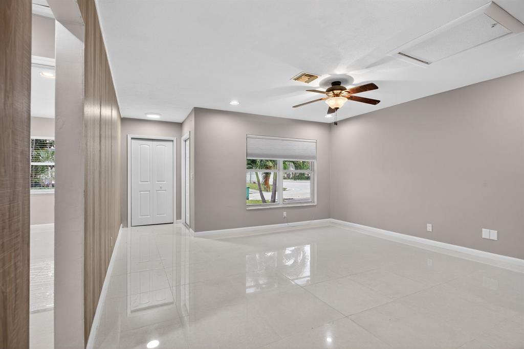 8709 Northwest 57th Drive Tamarac, FL 33321 - Photo 15 of 34 a view of an empty room with a window