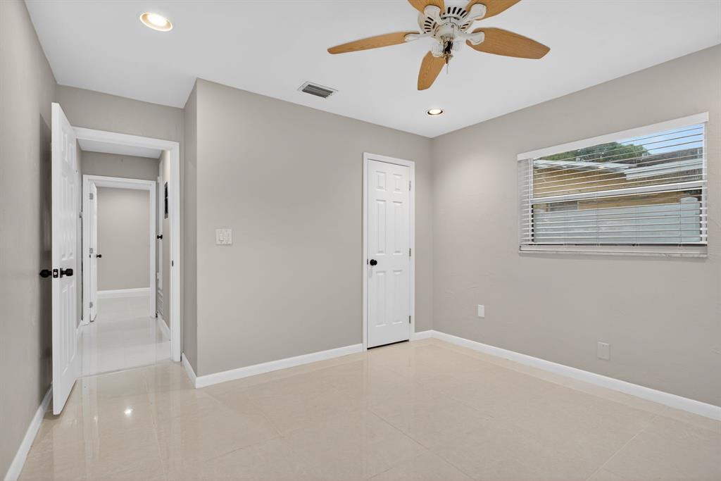 8709 Northwest 57th Drive Tamarac, FL 33321 - Photo 10 of 34 a view of an empty room with a window