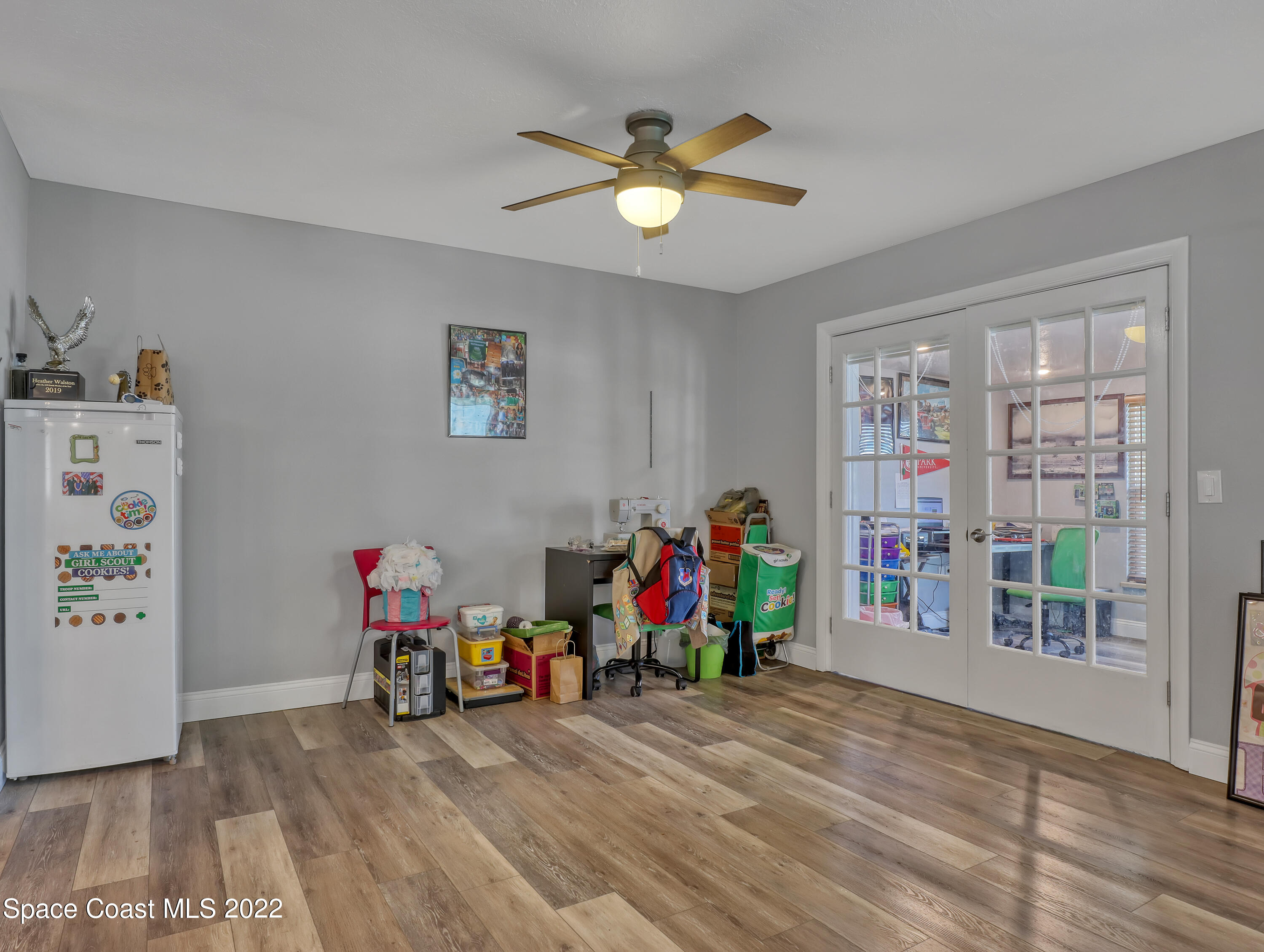 765 New Hampton Way Merritt Island, FL 32953 - Photo 13 of 37 a view of a room with toys and wooden floor