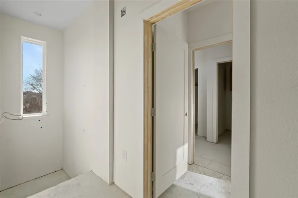 a view of a bathroom from a hallway