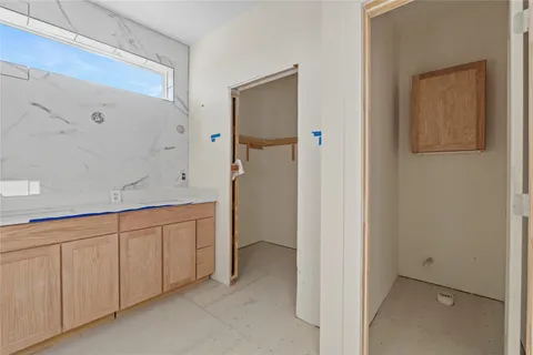 a spacious bathroom with a shower