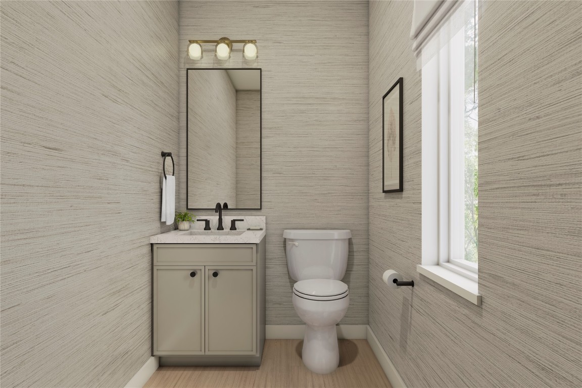 1180 Lott Avenue Austin, TX 78721 - Photo 6 of 17 a bathroom with a toilet a sink and mirror