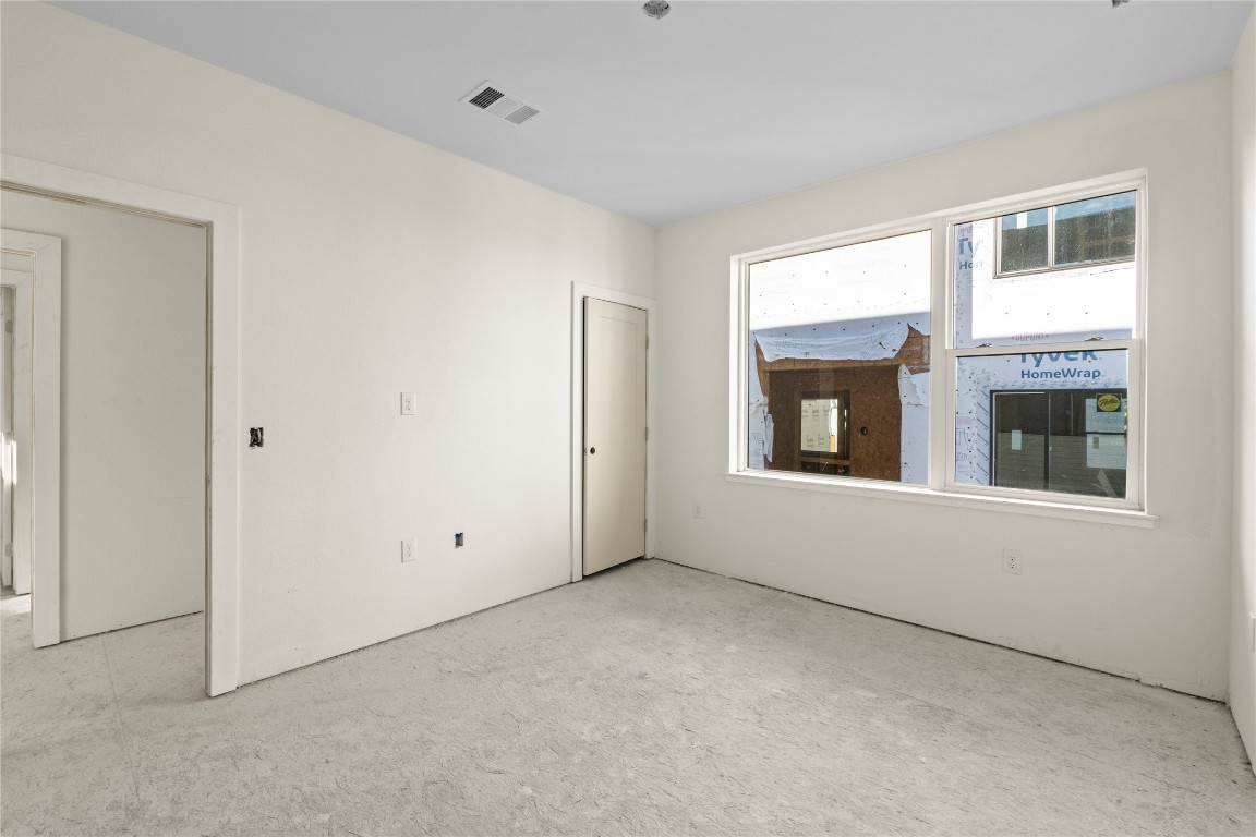 1180 Lott Avenue Austin, TX 78721 - Photo 8 of 40 a view of an empty room with a window