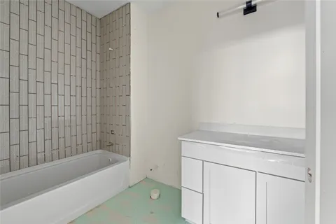 a bathroom with a bathtub